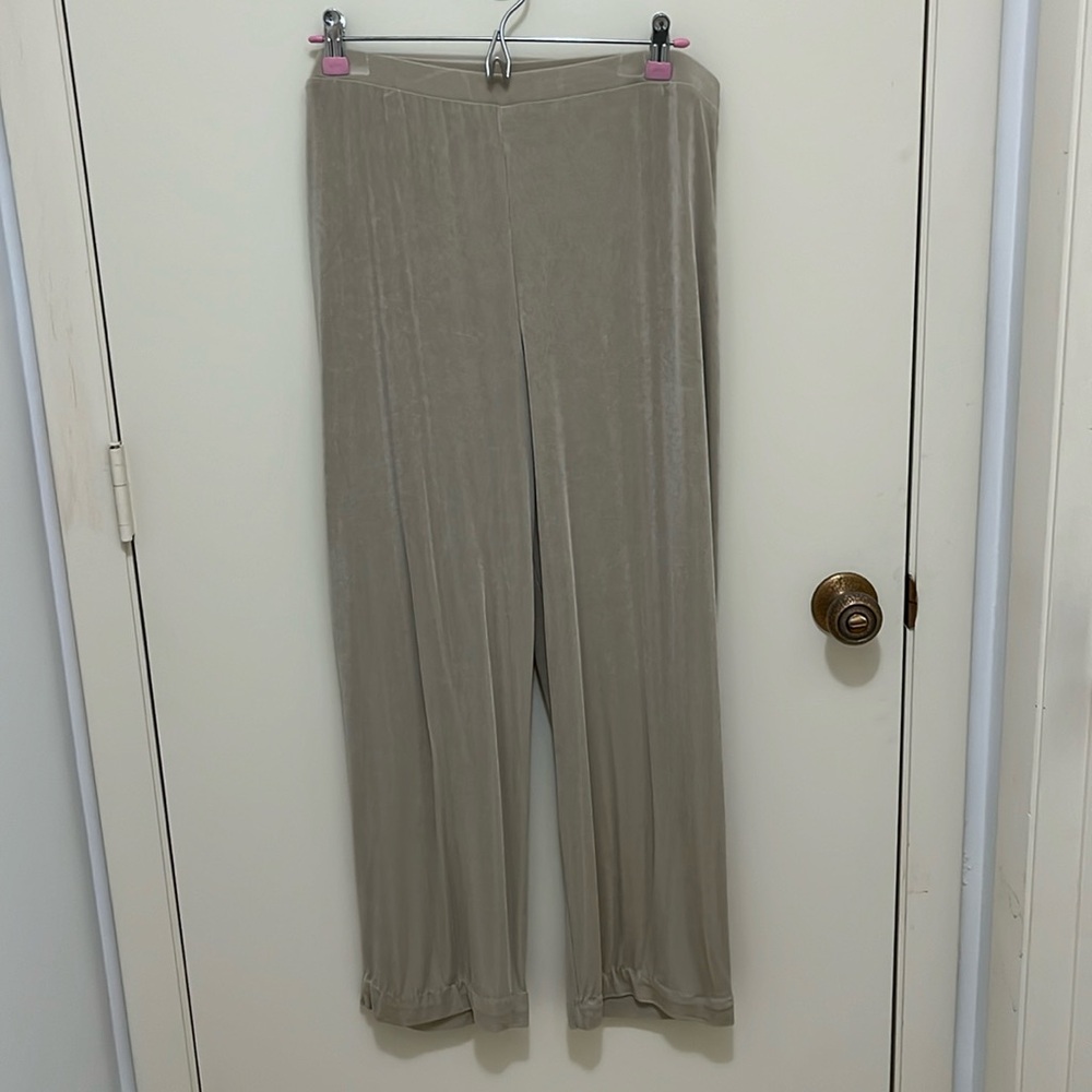 Three pair of Chico’s Travelers Pants.